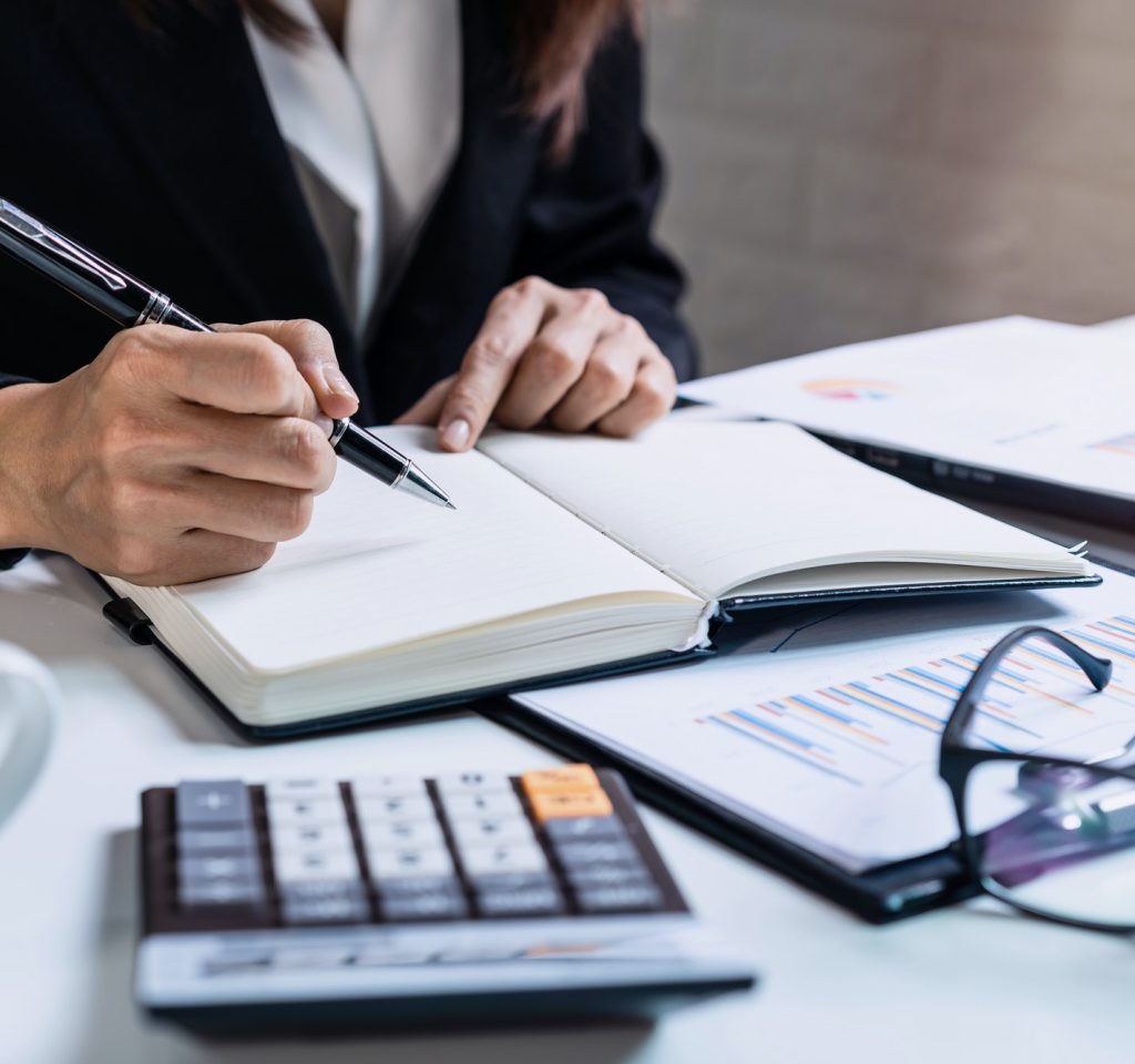 businesswoman-working-on-desk-office-with-marketing-graph-statistics-analysis.jpg